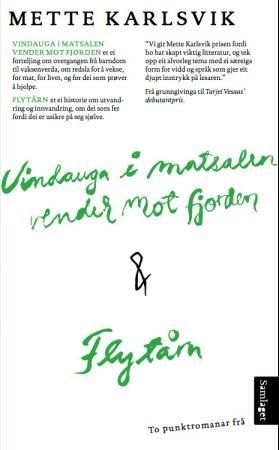Vindauga i matsalen vender mot fjorden